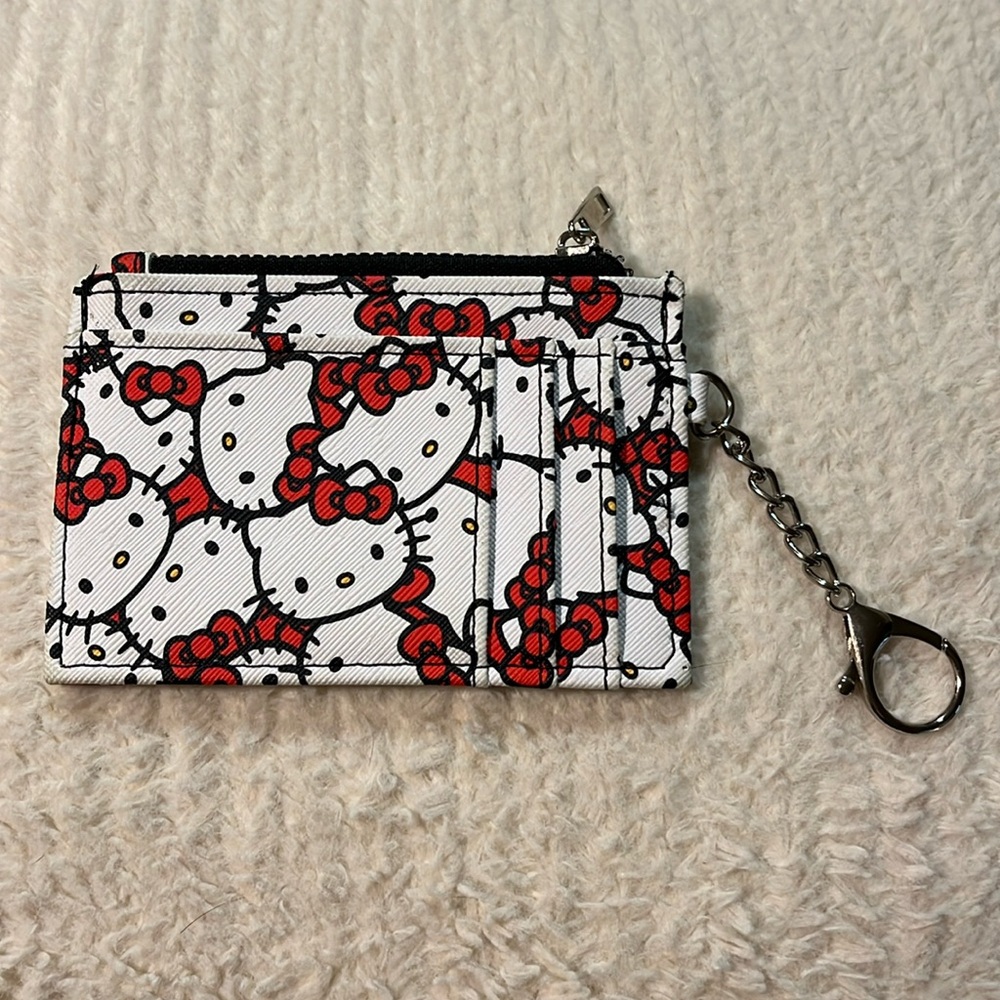 NWOT “Wonderland" Hello Kitty Card Wallet!